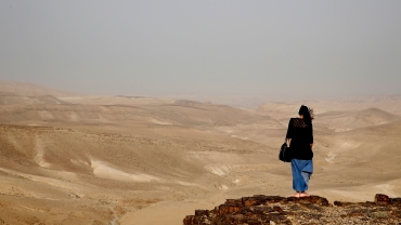 A woman in the Judean desert