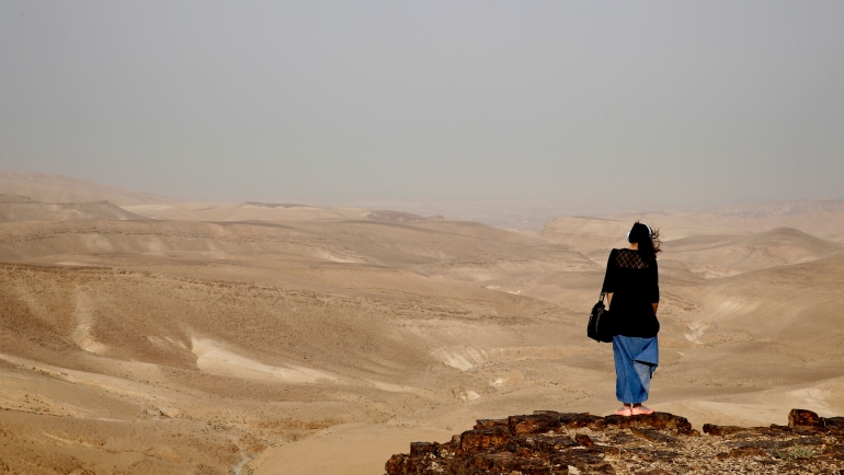 A woman in the Judean desert