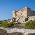 St. Lucians Tower or It-Torri ta' San Lucjan in Maltese, a large fortified Knights of St John watchtower overlooking Marsaxlokk Bay