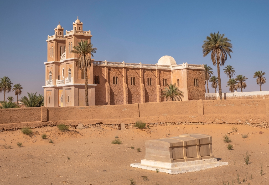 Tomb of Charles de Foucauld with church in background in El Ménia, Algeria