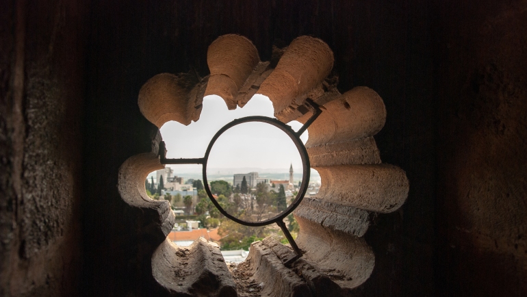 View on city of Ramla from the figure window of White Mosque - ancient Umayyad mosque. Israel