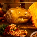 Statue of the sleeping Buddha or Parinirvana in Kushinagar, India.