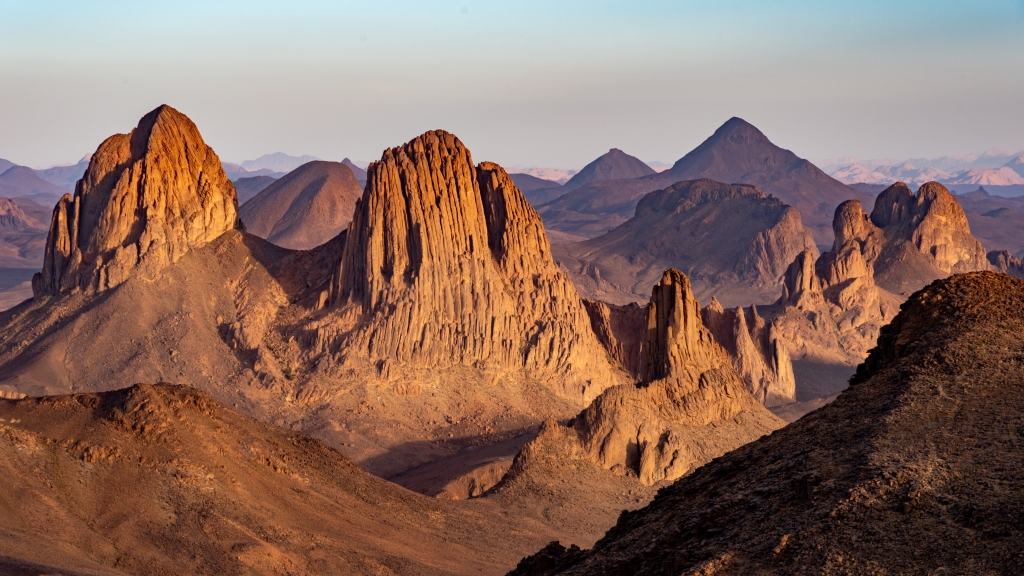 Landscape of the Home in the Sahara Desert, Algeria. A view of the mountains and basalt organs surrounding the dirt road leading to Assekrem.