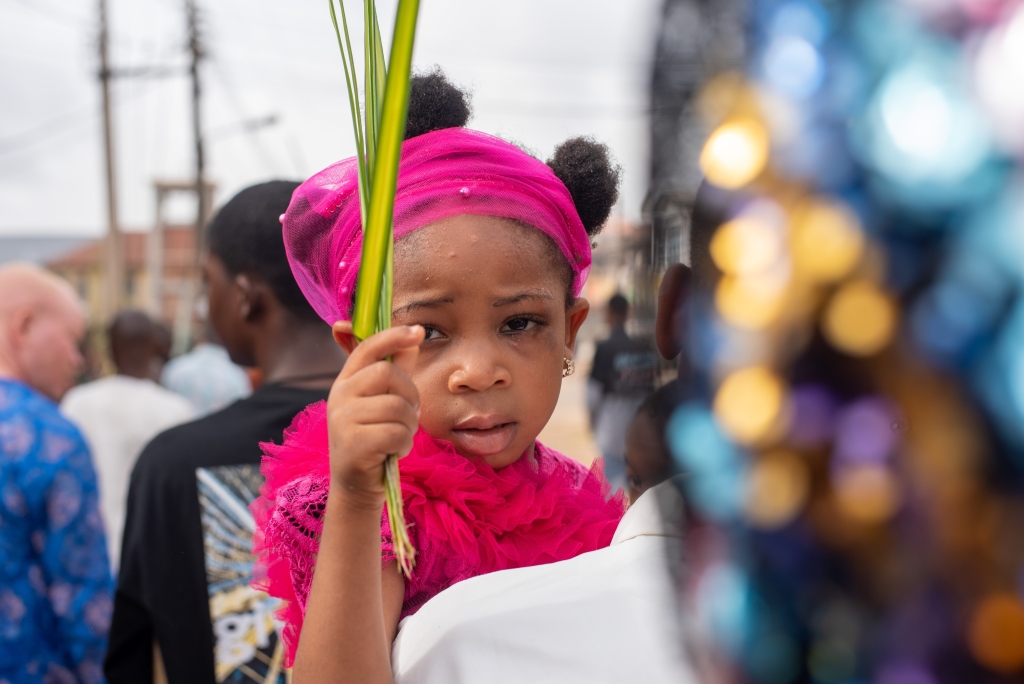 A Christian girl in the Palm Sunday procession