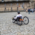 Pilgrim with a disability arriving in Santiago de Compostela.