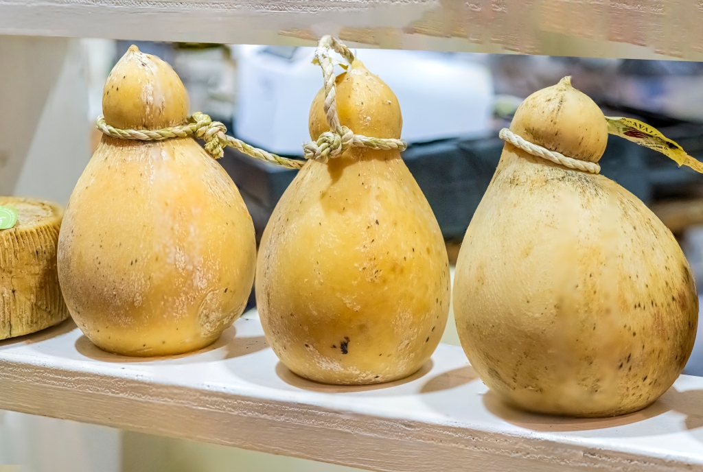 Selection of "caciocavallo" cheeses at a typical Italian farmers' market