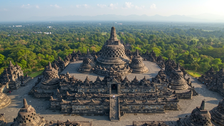 A breathtaking aerial view of Borobudur Temple, the world’s largest Buddhist monument, located in Magelang, Central Java, Indonesia.
