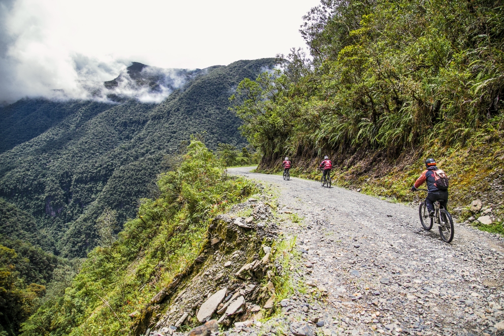 Participants in the descent of the world's most dangerous route, La Cumbre, pass at 4,700 meters above sea level, known as the "Route of Death" in Bolivia. South America