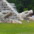 The sculpture at the base of the feathered serpent pyramid - Chichen Itza, Mexico