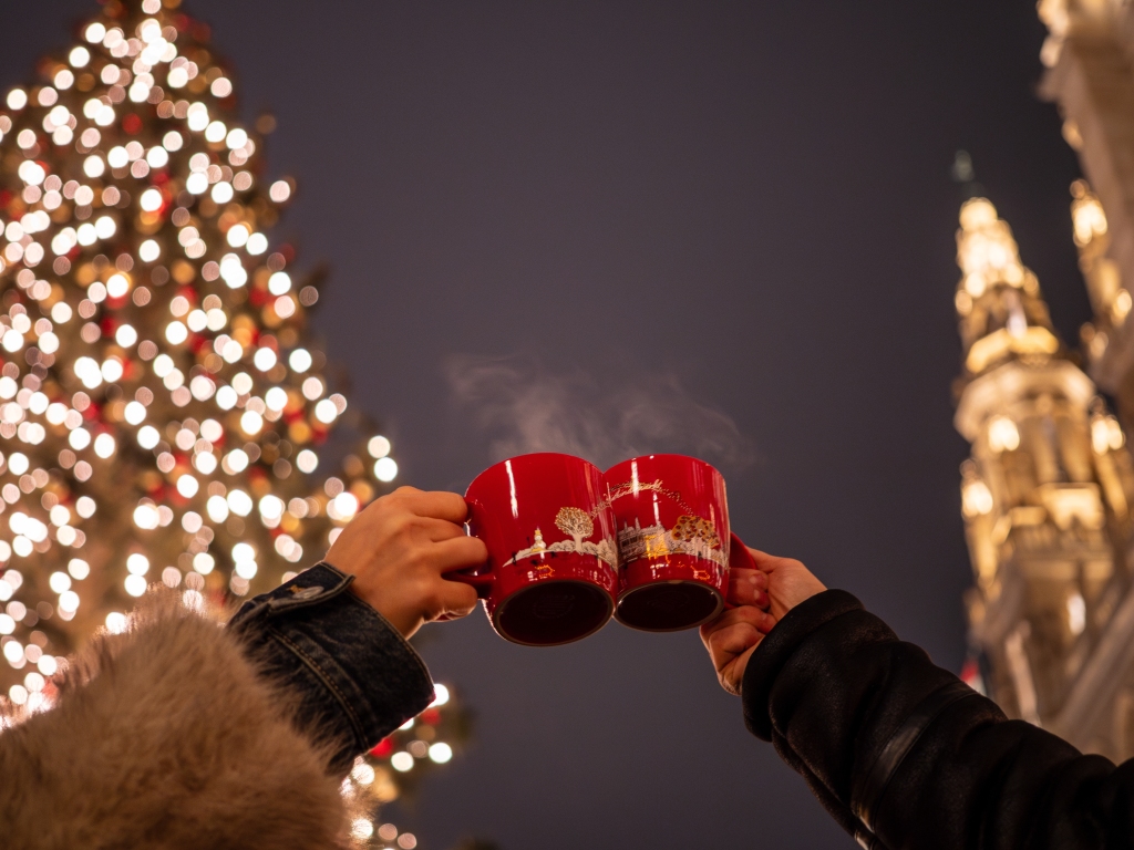 A toast with Christmas punch at the Rathausplatz Christmas markets in Vienna.