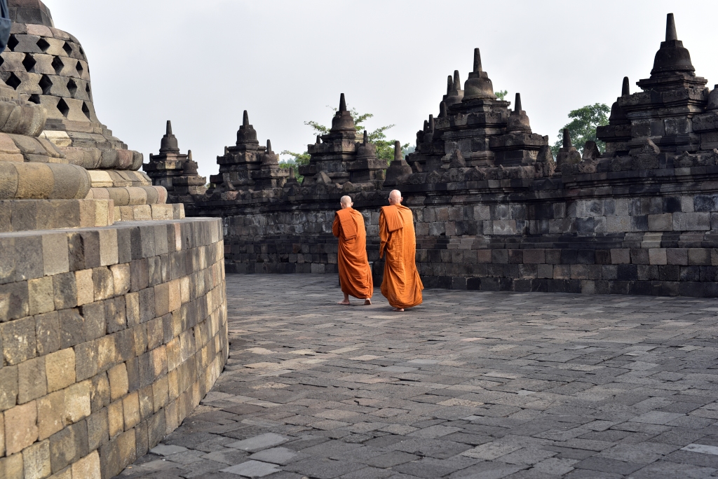 Monks make a pilgrimage around the Borobudur stupa in Java, Indonesia
