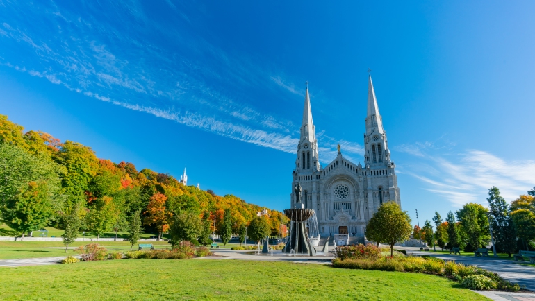 Morning exterior view of the Basilica of Sainte-Anne-de-Beaupre Church in Quebec, Canada