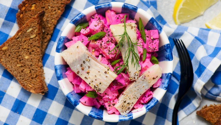 Traditional Swedish salad with herring, apple and beetroot
