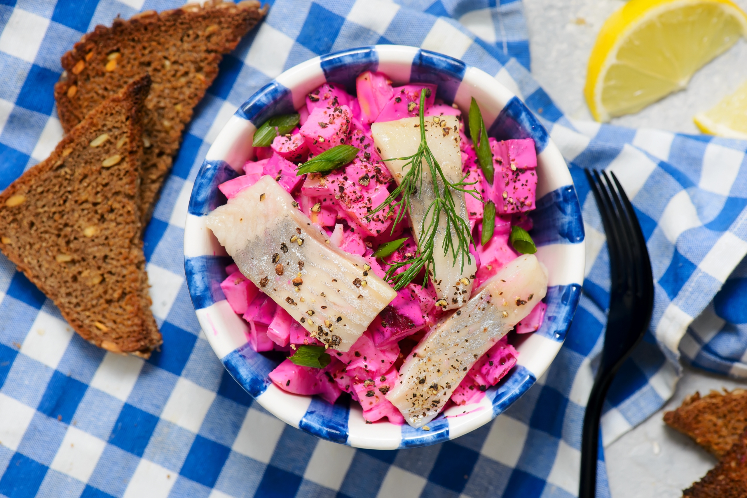 Traditional Swedish salad with herring, apple and beetroot