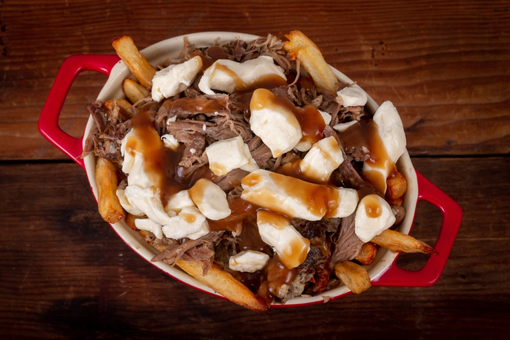 A popular variation of the dish: poutine with duck confit