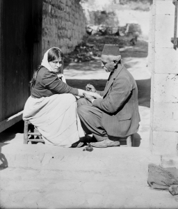 'Tattoing a pilgrim', Jerusalem, American Colony Photo Department, 1900-1920