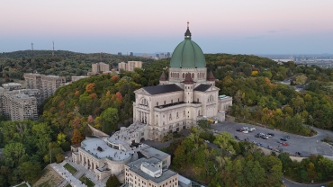 Dome of St. Joseph's Oratory and Montreal skyline at dusk