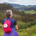 Pilgrim after a tough stage on the Camino de Santiago, enjoying the scenery of northern Spain, Asturias