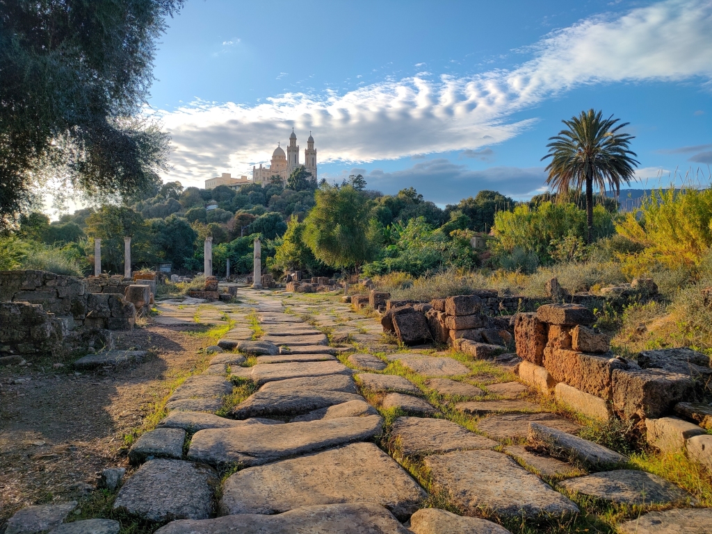 The Roman archaeological site of Hippo, and the Basilica of St. Augustine on the hilltop in the background in Annaba
