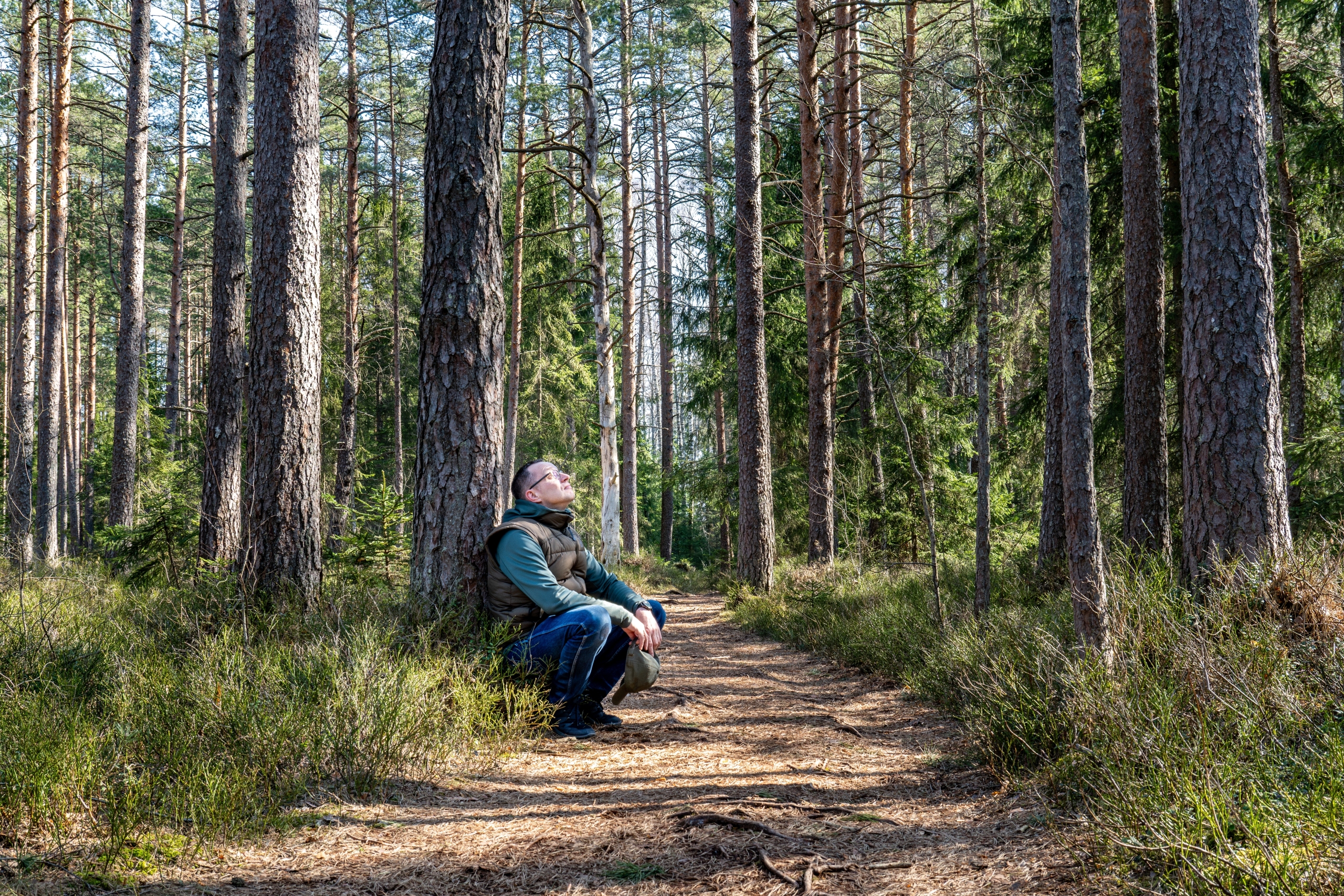 A man experiencing silence in nature