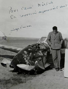 Antoine de Saint-Exupéry standing next to his Caudron C.630 Simoun, crashed in the Sahara Desert