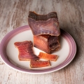 Tacos and slices of cured tuna loin, called mojama in Spain, a delicacy of Arab origin produced on the southern coast of Spain.