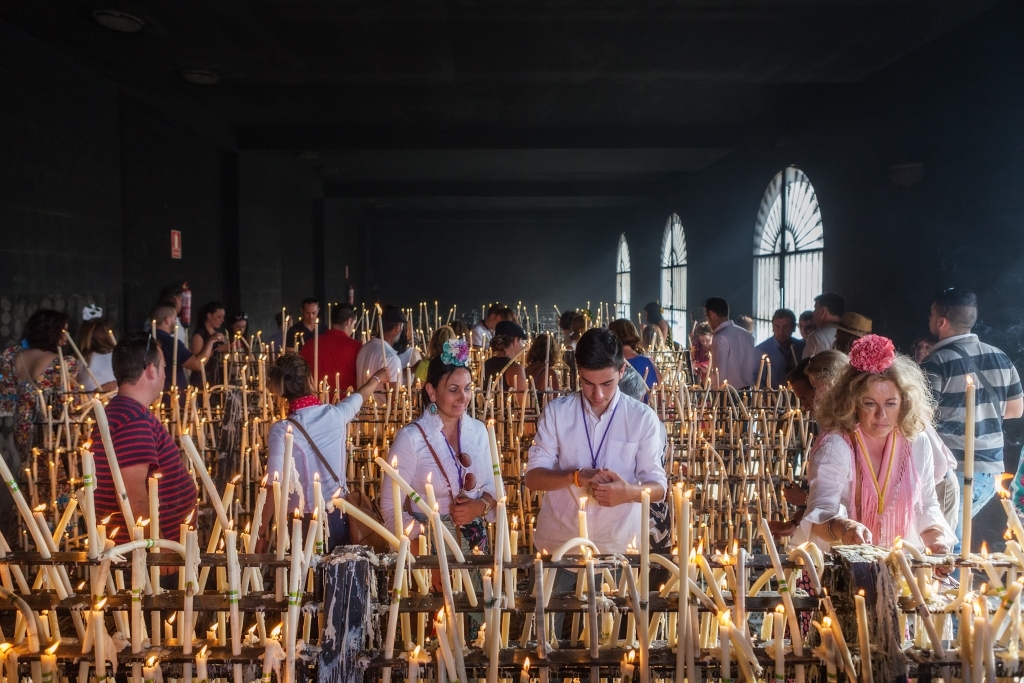 In the sacred Sanctuary lighting candles in memory of the deceased