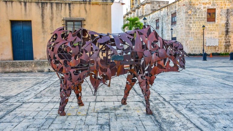 Bull sculpture of iron, Museum of the Royal House. Museum of Las Casas Reales near Alcazar de Colon. Dominican Republic