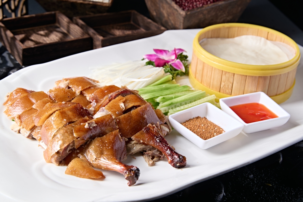 Roasted duck Peking style and served according to Confucian rules