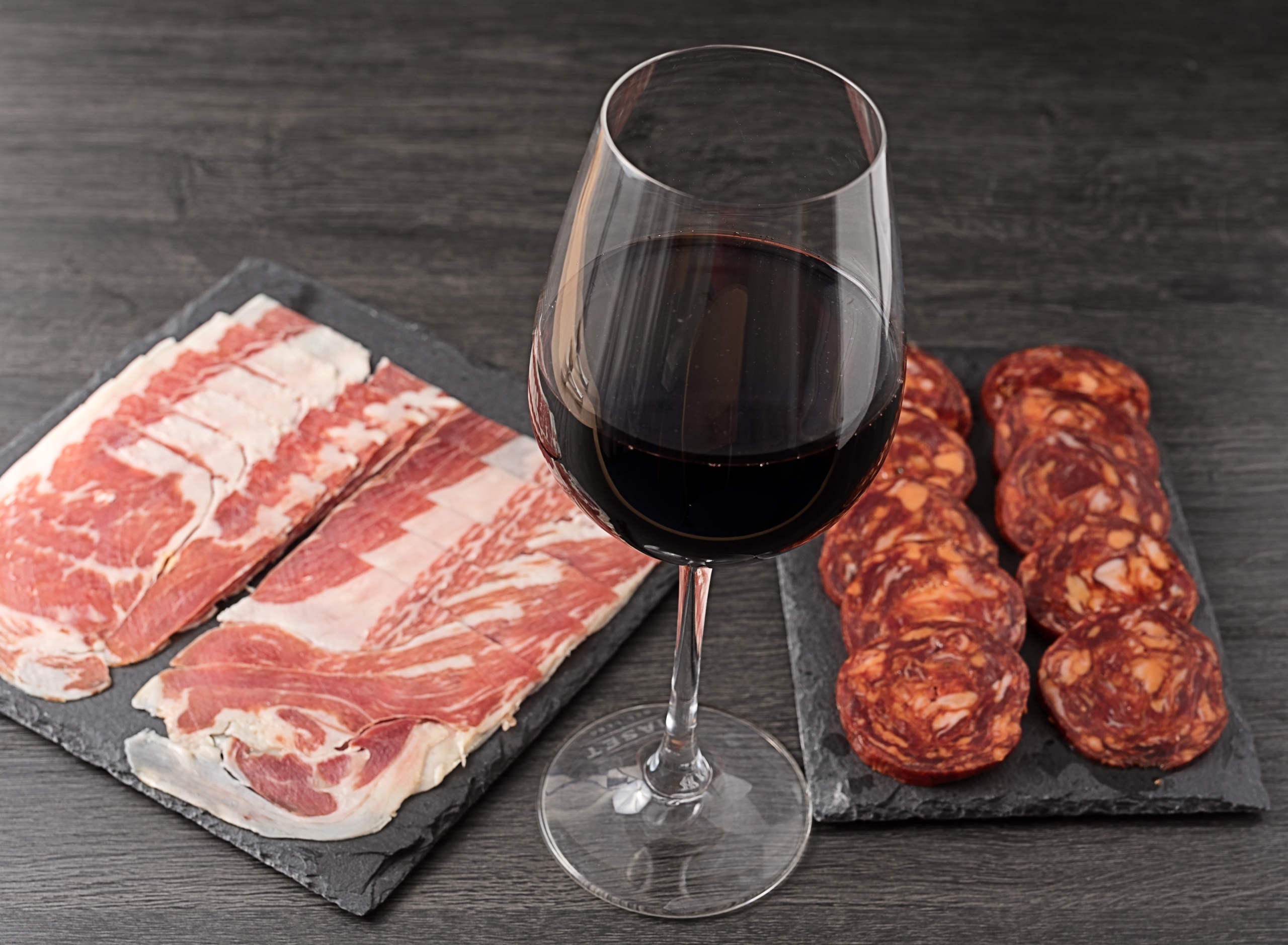 iberico sausage, iberico ham and a good wine denomination of origin ribera del duero