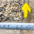 Spiritual Enlightning Motivational Writing next to the Yellow Arrow the Symbol of the Way of St James