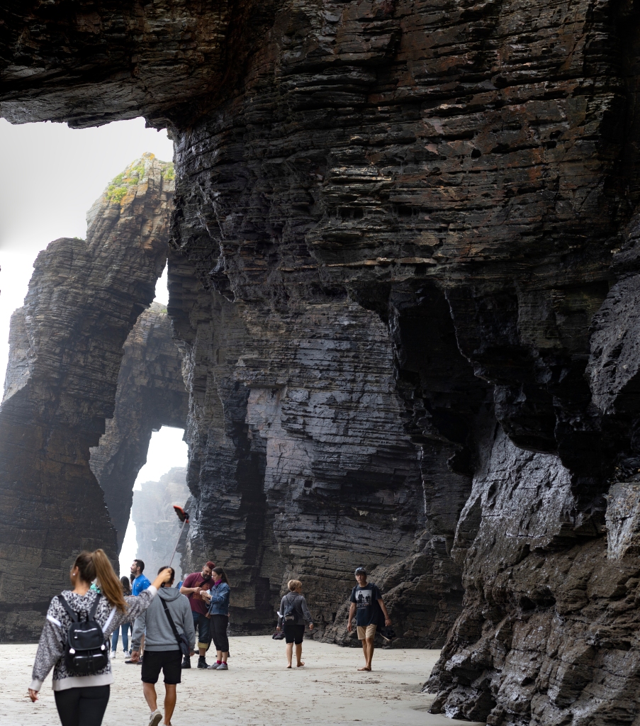 People walking at As Catedrais beach