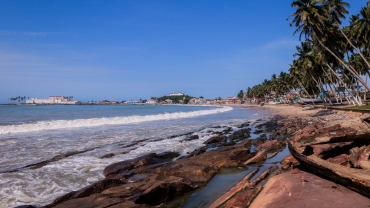 View of the Cape Coast Slave Castle from the Atlantic Ocean coast in Ghana, West Africa