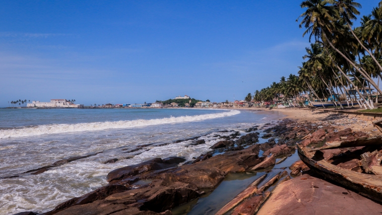 View of the Cape Coast Slave Castle from the Atlantic Ocean coast in Ghana, West Africa