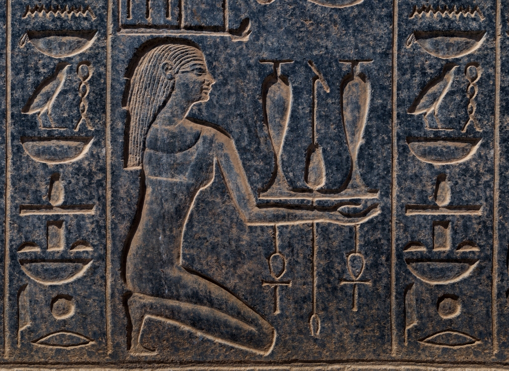 The wall reliefs depict a wine offering at the Temple of Karnak. Luxor, Egypt.