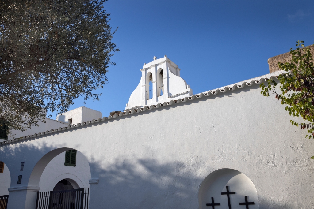 Entrance to the white church in Sant Antoni de Portmany. Ibiza is one of Spain's most iconic Balearic Islands.