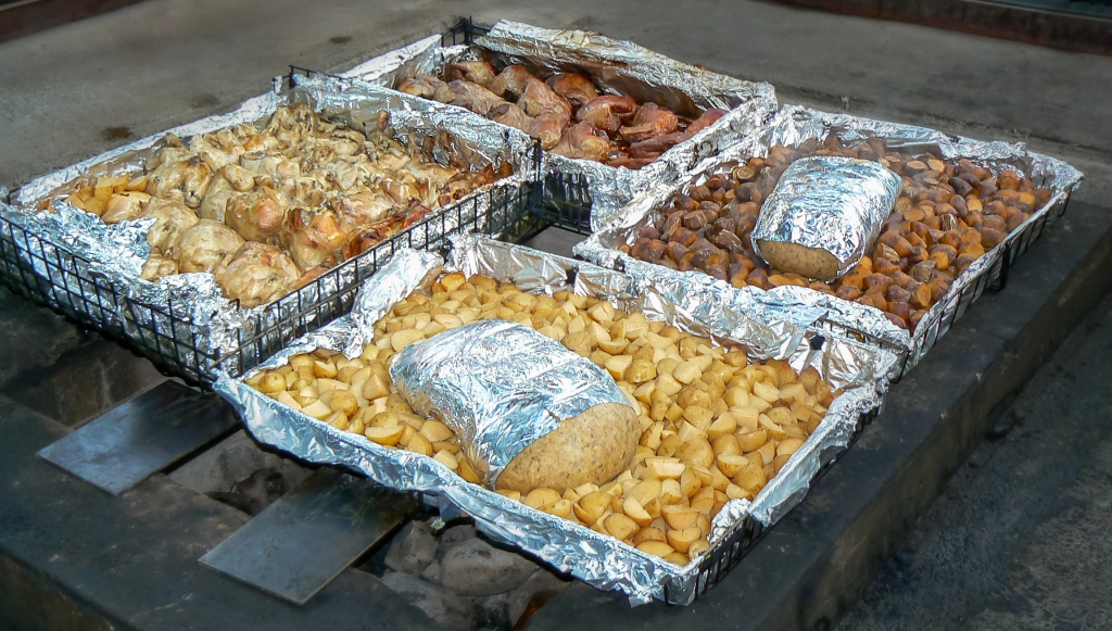 Hāngī food, prepared in the traditional Māori way—cooked underground in an earth oven—in Rotorua, North Island, New Zealand